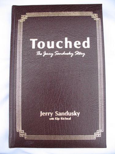 Illustration for article titled You Have Four Days Remaining To Bid On This Leather-Bound & Autographed Copy Of Jerry Sandusky's Book