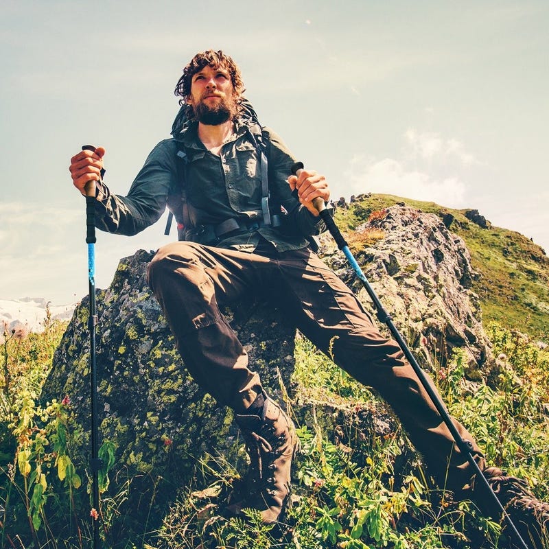 Illustration for article titled 25% OFF on Evocrest Carbon Fiber Trekking Poles - Collapsible, Shock Absorbent, Ultra Lightweight Walking Sticks - Quick Locks, Cork Handle - All Terrain Accessories IncludedÂ