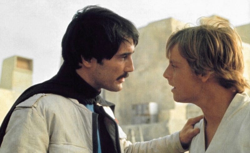 Luke Skywalker and Biggs Darklighter talk on Tatooine in the original Star Wars directed by George Lucas