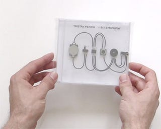 Illustration for article titled Mini Orchestra Plays on Microchip Inside CD Case