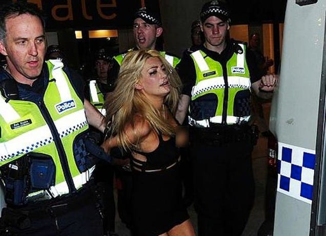 http://deadspin.com/model-strips-naked-fights-cops-at-aussie-rules-grand-f-...