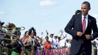 President Barack Obama dances to music in Dar es Salaam, Tanzania, in 2013. Saul Loeb/Getty Images