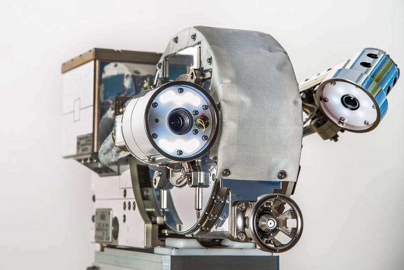 Illustration for article titled This Robot is All Eyes to Inspect Satellites in Orbit