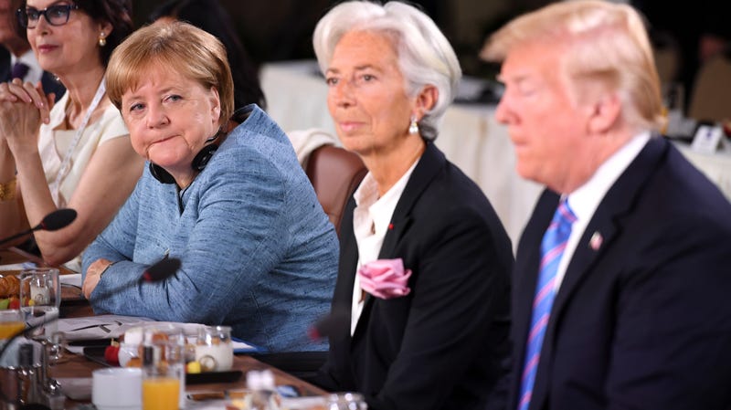 Illustration for article titled Angela Merkel Would Very Much Like Donald Trump to Put His Dick Back in His Pants