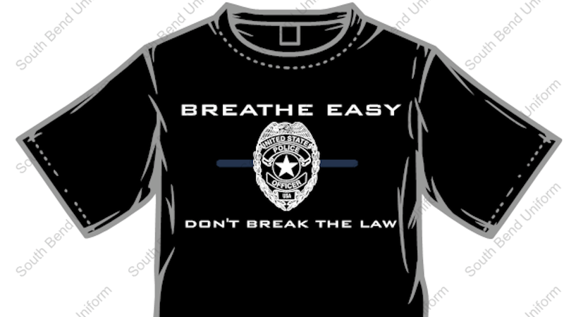 Illustration for article titled An Indiana Cop Is Hawking 'Breathe Easy, Don’t Break The Law' Shirts