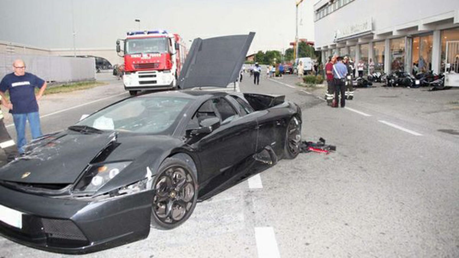 Out Of Control Lamborghini Destroys BMW Motorcycle Dealership