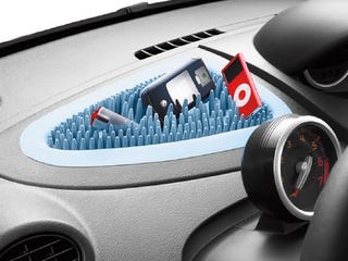 Illustration for article titled Renault Dashboard Gadget Holder that Actually Works