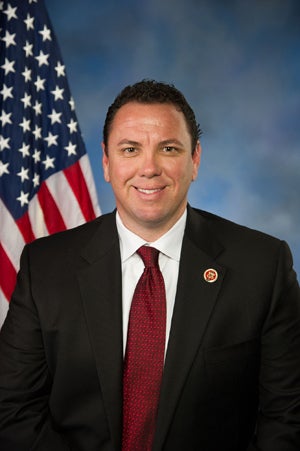 Illustration for article titled 'Kissing Congressman' Won't Resign Though He Has 'Wrecked' Lives
