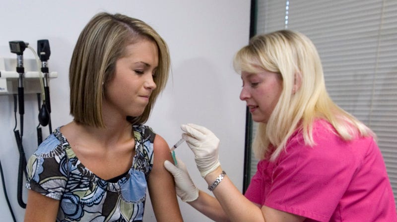 She is getting an HPV vaccine (Image: AP Images)