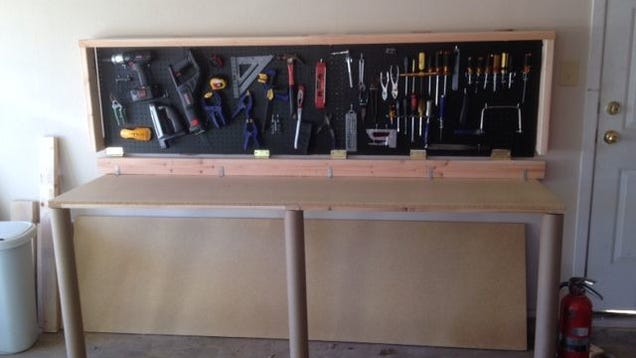 build this wall-mounted, folding workbench to save space