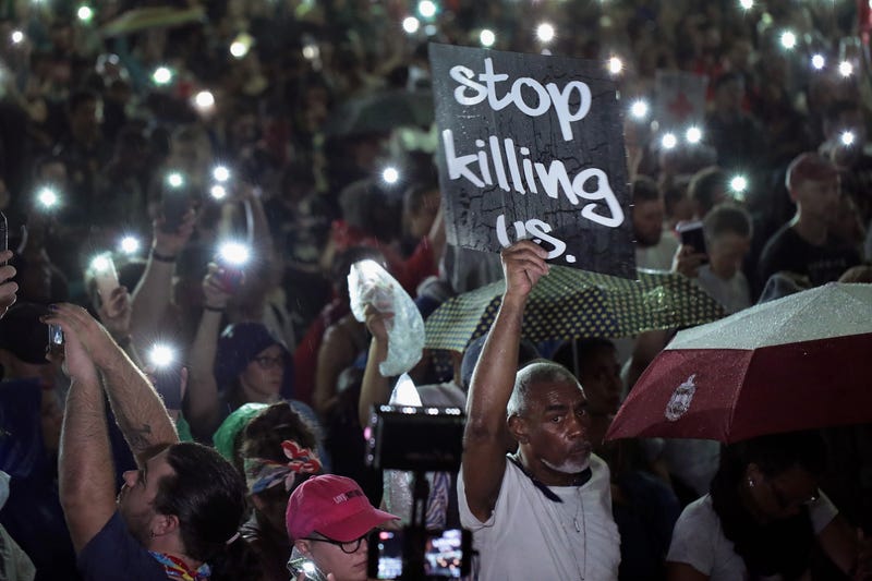 Demonstrators protest outside of the St. Louis city jail following the arrest of 123 people yesterday protesting the acquittal of former St. Louis police officer Jason Stockley on September 18, 2017 in St. Louis, Missouri.