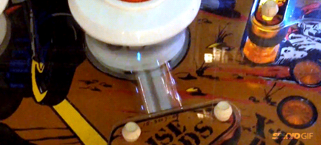 Magic pinball gets perfectly stuck between a bumper and kicker forever