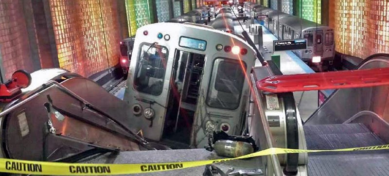 Illustration for article titled 32 Injured As Derailed Chicago Train Tries To Climb O'Hare Escalator