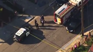 Emergency personnel in the Oakland, Calif., neighborhood of 30th and Linden streetsYouTube screenshot