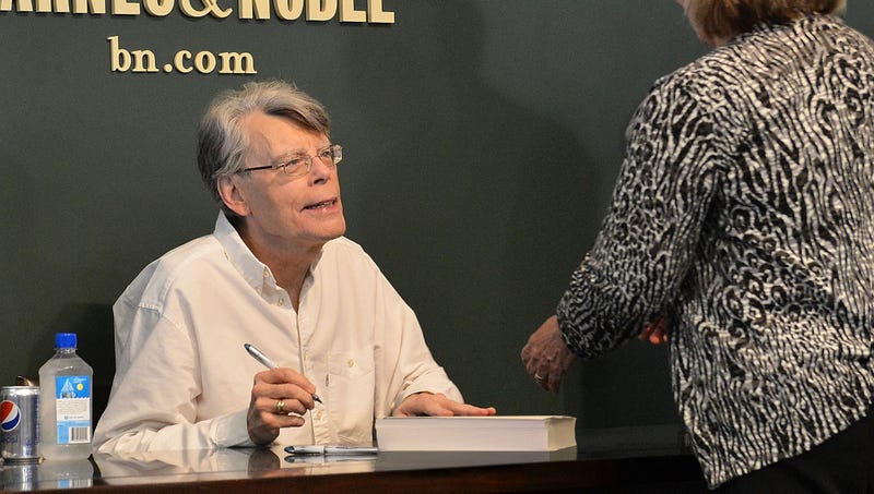 Illustration for article titled Stephen King Stuck At Book Signing For Hours Writing Personalized Novels For Line Of Fans