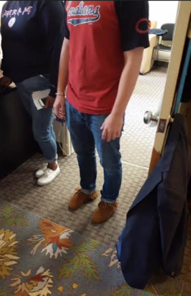Crestfallen college kid and Cleveland Indian fan whose moccasins were a bit over the top.