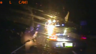Sheriff Mark Amos tackling Stuart Fitzgerald in May 2014WUSA9 screenshot
