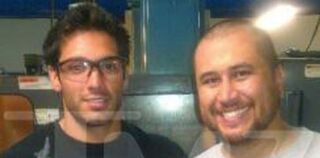 George Zimmerman with an employee from Kel-Tec (TMZ)