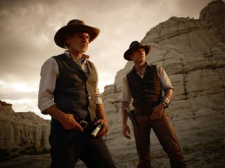 Illustration for article titled Take a closer look at Cowboys and Aliens' all-out extraterrestrial war
