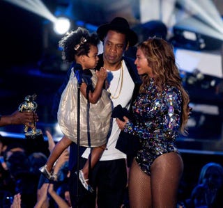 Jay Z and Beyoncé with their daughter, Blue Ivy Carter, onstage during the 2014 MTV Video Music Awards at the Forum on Aug. 24, 2014, in Inglewood, Calif. Mark Davis/Getty Images