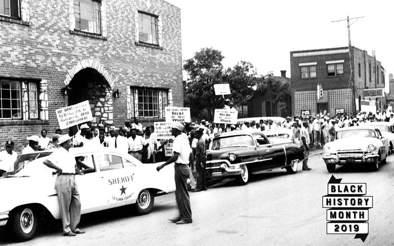 Black demonstrators protest hiring practices at a $13 million federal housing project in East St. Louis, Illinois, Aug. 8, 1960.