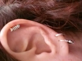 Illustration for article titled Lookit my teeny tiny fish earring.