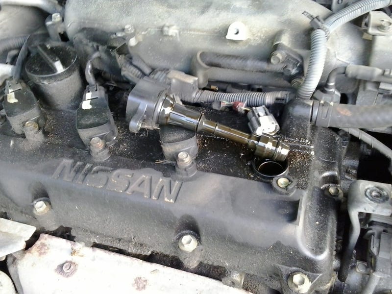 Illustration for article titled Altima Misfire, Oil in Spark Plug Wells