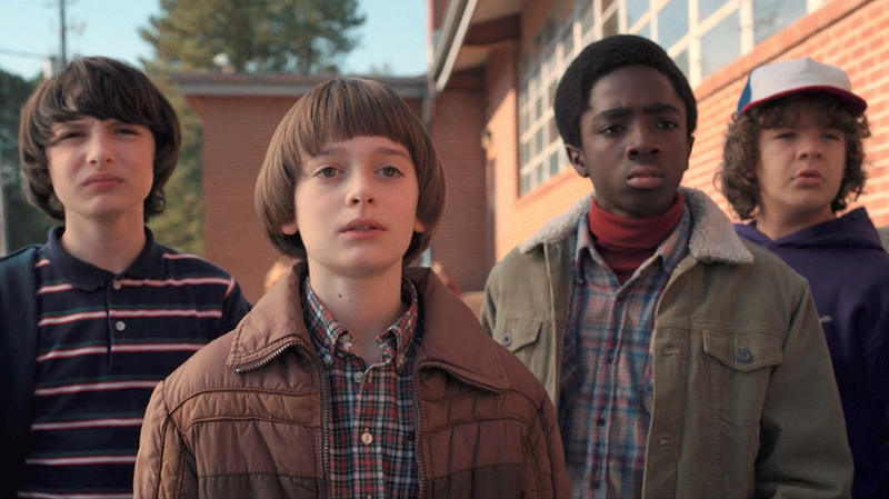 The Hawkins boys, reading your fan theories.