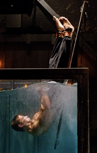 Illustration for article titled Smallville gives us Saul Tigh as Deathstroke (and erotic waterboarding)