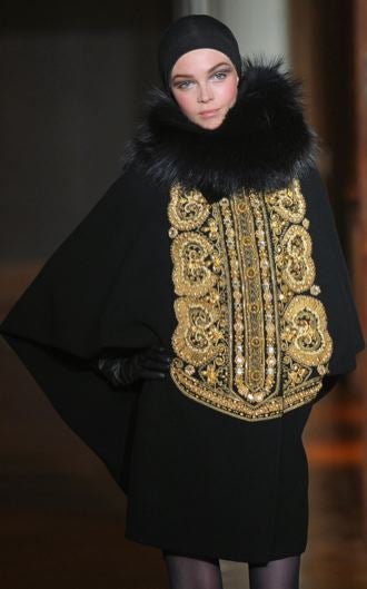 Illustration for article titled Christian Lacroix Couture Show A Blitz Of Somber Creativity For Dark Times