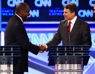 Herman Cain admonishes Rick Perry over "Niggerhead." (Getty) 