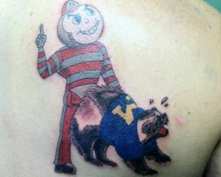 Illustration for article titled This Buckeyes Fan Deemed It Wise To Get An Anal-Rape Themed Tattoo