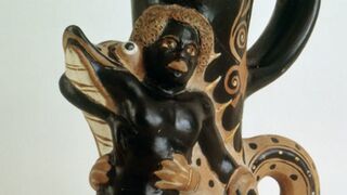 Rhyton in the form of a black youth seized by a crocodile, circa 340-320 BC. Greek, south Italian. Cambridge, UK.