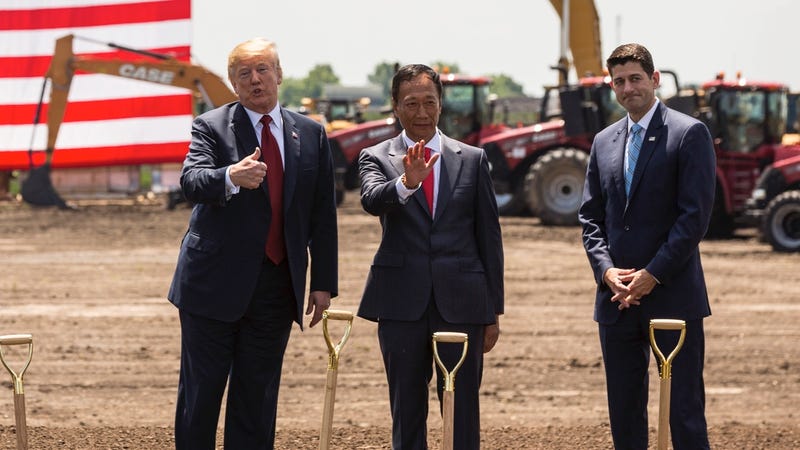 The President of the United States standing like a normal human being (left) with Foxconn CEO Terry Gou (center) and Paul Ryan (right) on June 28, 2018