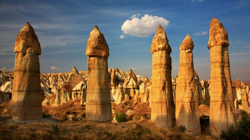 Illustration for article titled These 100-foot phallic sculptures are not manmade