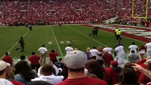 Watch An Oklahoma Idiot On The Field Get Leveled By State Trooper