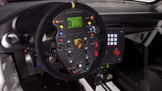 Illustration for article titled The Porsche 911 GT3 R Hybrid's wheel is the world's most insane video game controller