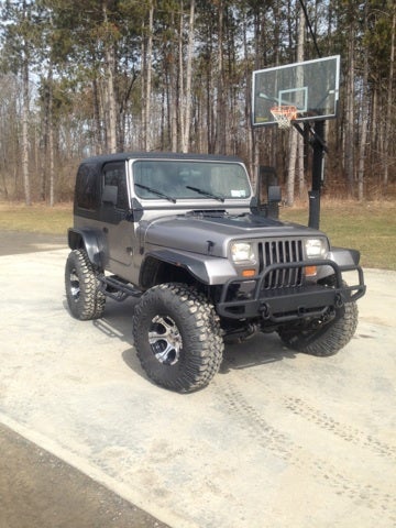 Illustration for article titled For $13,000, Buy My Roommate's Conversion Diesel Manual Jeep!
