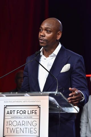 Dave Chappelle speaks onstage during the Rush Philanthropic Arts Foundation Celebrates 20th Anniversary at Art for Life event, July 18, 2015, in Water Mill, N.Y.Eugene Gologursky/Getty Images for Bombay Sapphire Gin