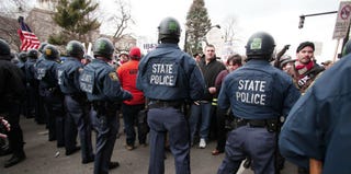 Protests against Michigan's right-to-work law (Getty Images)