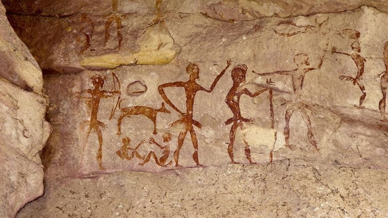 Illustration for article titled Archaeologists Discover Cave Where Ancient Humans First Had To Pretend To Like Friend’s Art