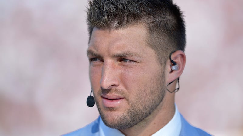 Illustration for article titled Tim Tebow Hired as Good Morning America Correspondent (Spit Take)