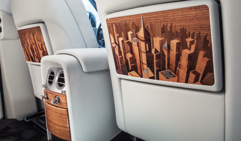 Illustration for article titled This $600K Rolls-Royce Has A City Carved Into Its Interior