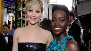 Actresses Jennifer Lawrence and Lupita Nyong’o attend the 20th Annual Screen Actors Guild Awards at the Shrine Auditorium in Los Angeles, Jan. 18, 2014.Kevork Djansezian/Getty Images