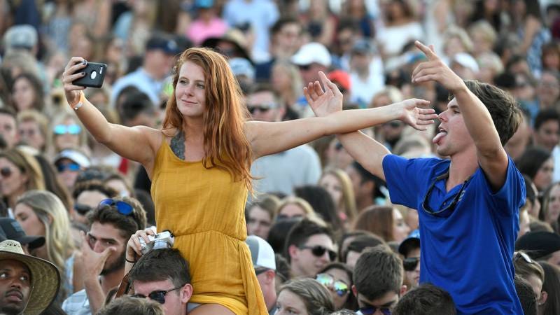 See the guy in the straw hat on the bottom left? Probably a Xennial. (Photo: Stan Badz / Getty Images)