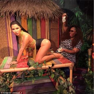 A visitor to Madame Tussauds wax museum in Las Vegas throws dollars at a wax figure of Nicki Minaj. Museum patrons have been taking lewd photos with the figure and posting them to social media since the figure’s unveiling.Instagram/platimum_d