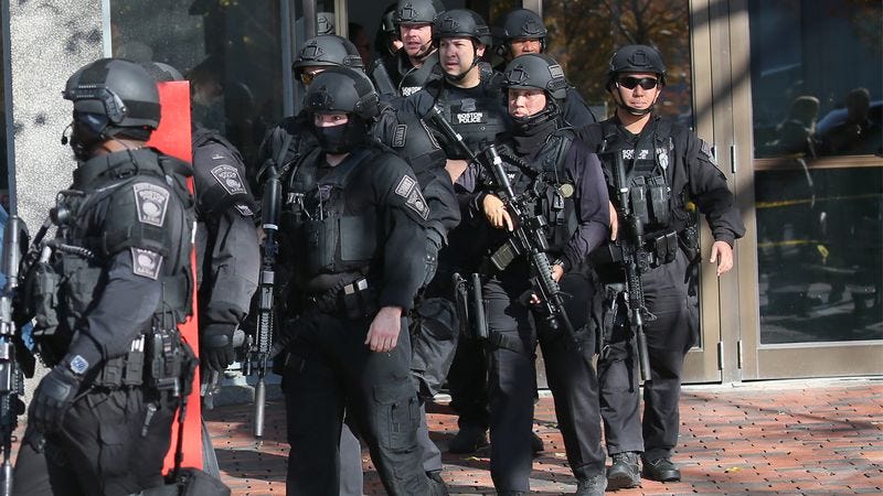 Illustration for article titled Report: Supplying Police With High-Powered Military Weapons To Sharply Reduce Costs Of Shooting Suspects Multiple Times