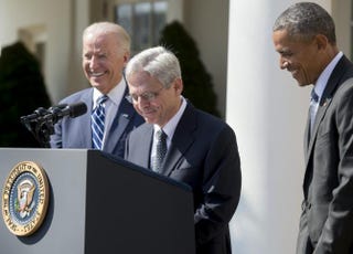 President Barack Obama (right) announces his Supreme Court nominee, federal appeals court Judge Merrick Garland (center), as Vice President Joe Biden looks on in the Rose Garden of the White House on March 16, 2016. SAUL LOEB/Getty Images