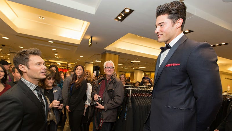 Illustration for article titled Caption This Pic of Ryan Seacrest Trapped Forever in a Moment of Awe
