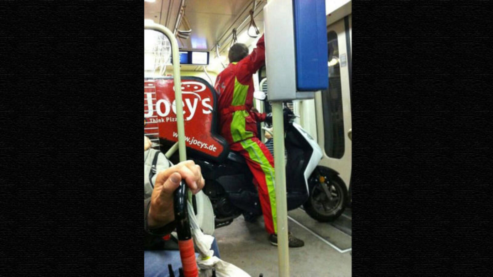World's Laziest Pizza Delivery Guy Takes The Subway On His Scooter [Update]